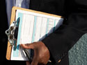 Application form on a clipboard