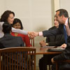 Shaking hands across the table