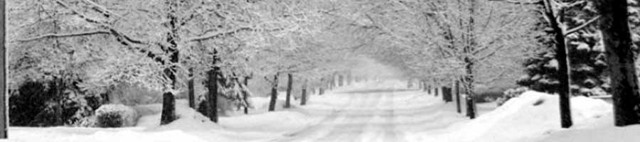 Winter city street after being snow plowed